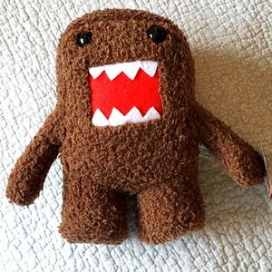 Stuffed Toy Domo Monster. Brown with big smile and looking for a hug. 9 inches